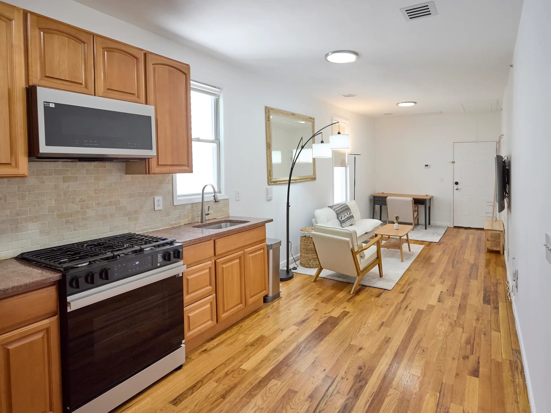 Kitchen and living area at 2197 John F Kennedy Blvd apartment 2R